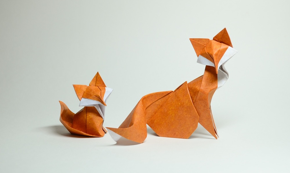 A pair of foxes by wet folding, by Vietnamese origami artist Hoang Tien Quyet.