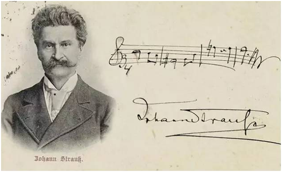 Music notation handwritten by Johann Strauss II, with his signature.